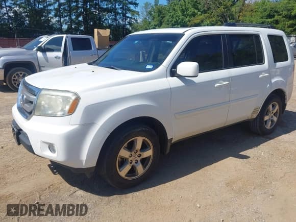 ✅ 2011 Honda Pilot EX-L • VIN: 5FNYF3H71BB002820 • Lot: 42821577. Listed on IAAI with 167,697 mi. Free auction sales archive from the USA and detailed vehicle history report at DreamBid. Image 2.