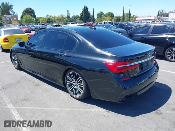 ✅ 2019 BMW 7 Series 740i • VIN: WBA7E2C55KB216529 • Lot: 42837792. Listed on IAAI with 81,573 mi. Free auction sales archive from the USA and detailed vehicle history report at DreamBid. Image 3.
