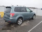 ✅ 2011 Subaru Forester XT Touring • VIN: JF2SHGGC1BH733139 • Lot: 43727979. Listed on IAAI with 180,835 mi. Free auction sales archive from the USA and detailed vehicle history report at DreamBid. Image 4.