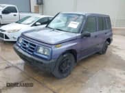 ✅ 1996 Geo Tracker • VIN: 2CNBE1361T6901708 • Lot: 41998005. Listed on IAAI with 223,266 mi. Free auction sales archive from the USA and detailed vehicle history report at DreamBid. Image 2.