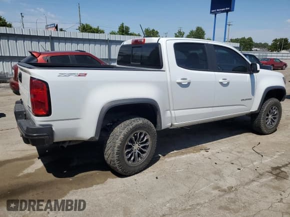 ✅ 2022 Chevrolet Colorado 4WD ZR2 • VIN: 1GCGTEENXN1251603 • Лот: 58966914. Опубликован ранее на Copart с пробегом 23 546 миль. Бесплатный доступ к архиву аукционных продаж из США и подробный отчёт об истории автомобиля на DreamBid. Изображение 3.