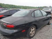 ✅ 1999 Ford Taurus SE • VIN: 1FAFP53U2XA116215 • Lot: 42210161. Listed on IAAI with 260,212 mi. Free auction sales archive from the USA and detailed vehicle history report at DreamBid. Image 4.