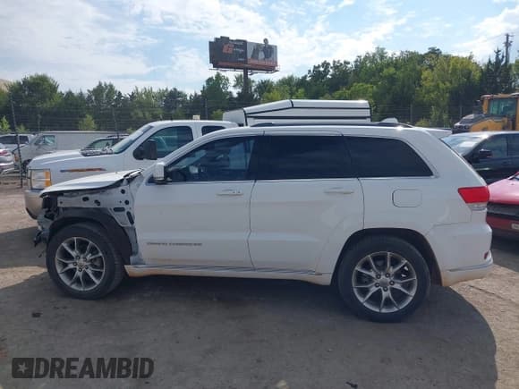 ✅ 2015 Jeep Grand Cherokee Summit • VIN: 1C4RJEJG5FC105296 • Lot: 43231201. Listed on IAAI with 124,311 mi. Free auction sales archive from the USA and detailed vehicle history report at DreamBid. Image 15.