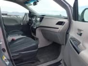 ✅ 2014 Toyota Sienna SE • VIN: 5TDXK3DC4ES491269 • Lot: 42004485. Listed on IAAI with 118,516 mi. Free auction sales archive from the USA and detailed vehicle history report at DreamBid. Image 5.