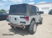 ✅ 2009 Jeep Wrangler X • VIN: 1J4FA24189L755392 • Lot: 42811063. Listed on IAAI with 97,644 mi. Free auction sales archive from the USA and detailed vehicle history report at DreamBid. Image 4.