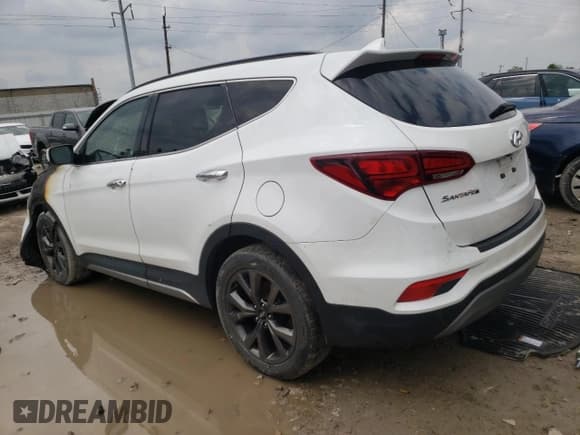 ✅ 2018 Hyundai Santa Fe Ultimate • VIN: 5NMZWDLA4JH103702 • Лот: 51429693. Опубликован ранее на Copart с пробегом Не указан. Бесплатный доступ к архиву аукционных продаж из США и подробный отчёт об истории автомобиля на DreamBid. Изображение 2.