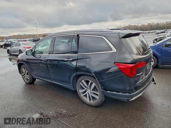 ✅ 2017 Honda Pilot Touring • VIN: 5FNYF6H94HB022653 • Lot: 94408435. Listed on Copart with 74,411 mi. Free auction sales archive from the USA and detailed vehicle history report at DreamBid. Image 2.