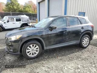 ✅ 2016 Mazda CX-5 Sport • VIN: JM3KE4BY3G0780937 • Лот: 91294055. Опубликован ранее на Copart с пробегом 57 540 миль. Бесплатный доступ к архиву аукционных продаж из США и подробный отчёт об истории автомобиля на DreamBid. Изображение 1.