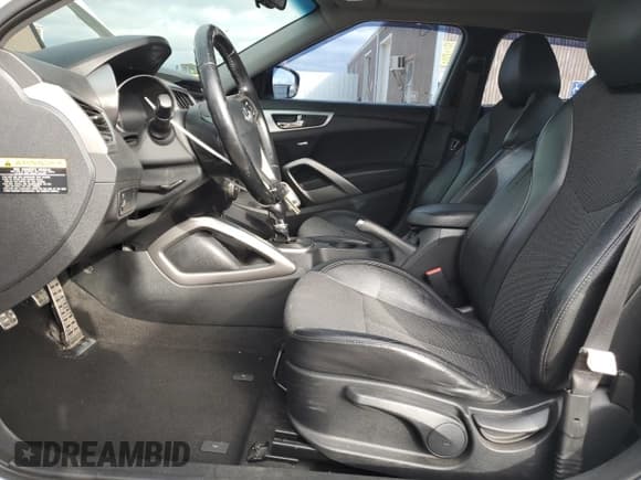 ✅ 2013 Hyundai Veloster w/Gray Int • VIN: KMHTC6ADXDU156677 • Lot: 79303324. Wystawiony na Copart z przebiegiem 72 584 mil. Bezpłatny archiwum sprzedaży aukcyjnych z USA i szczegółowy raport historii pojazdu na DreamBid. Zdjęcie 7.