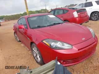 2008 Hyundai Tiburon GS z VIN KMHHM66D68U277885, wystawiony jako IAAI lot #42172920 z przebiegiem 205 023 mil mil oraz . Historia ofert i sprzedaży dostępna na DreamBid. Obrazek 1.