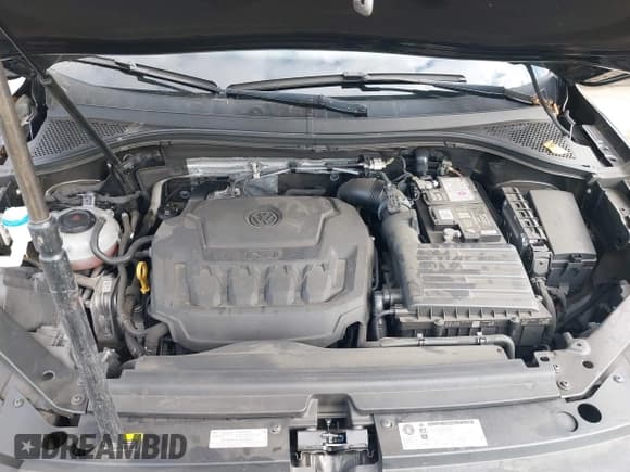 ✅ 2018 Volkswagen Tiguan SEL • VIN: 3VV3B7AX8JM094771 • Лот: 43419406. Опубликован ранее на IAAI с пробегом 54 219 миль. Бесплатный доступ к архиву аукционных продаж из США и подробный отчёт об истории автомобиля на DreamBid. Изображение 10.