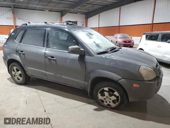 2006 Hyundai Tucson GL z VIN KM8JM12B96U289857, wystawiony jako Copart lot #83230864 z przebiegiem 222 817 mil mil oraz Szkoda całkowita • Salvage title. Historia ofert i sprzedaży dostępna na DreamBid. Obrazek 4.