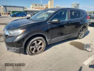 ✅ 2018 Honda CR-V EX • VIN: 7FARW1H59JE033971 • Lot: 93123935. Wystawiony na Copart z przebiegiem 140 479 mil. Bezpłatny archiwum sprzedaży aukcyjnych z USA i szczegółowy raport historii pojazdu na DreamBid. Zdjęcie 1.