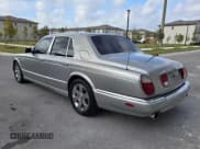 ✅ 2001 Bentley Arnage • VIN: SCBLC31E91CX06337 • Лот: 84920534. Опубликован ранее на Copart с пробегом 51 938 миль. Бесплатный доступ к архиву аукционных продаж из США и подробный отчёт об истории автомобиля на DreamBid. Изображение 3.