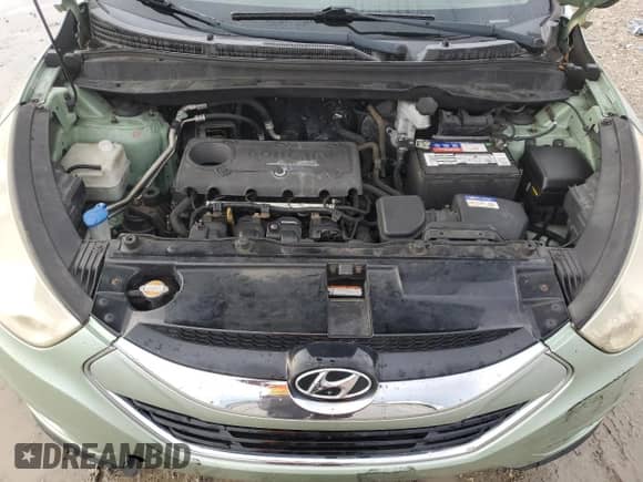 2011 Hyundai Tucson Limited z VIN KM8JU3AC8BU177633, wystawiony jako Copart lot #72858954 z przebiegiem 146 020 mil mil oraz Szkoda całkowita • Salvage title. Historia ofert i sprzedaży dostępna na DreamBid. Obrazek 13.