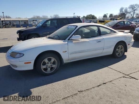 ✅ 1996 Mazda MX-6 • VIN: 1YVGE31D5T5566451 • Lot: 88347915. Listed on Copart with 172,188 mi. Free auction sales archive from the USA and detailed vehicle history report at DreamBid. Image 1.