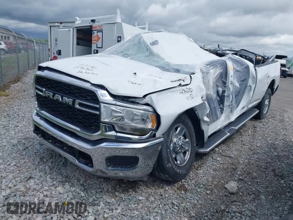 ✅ 2023 Ram 2500 Tradesman • VIN: 3C6UR5HL3PG529636 • Lot: 42062830. Listed on IAAI with Not provided. Free auction sales archive from the USA and detailed vehicle history report at DreamBid. Image 2.