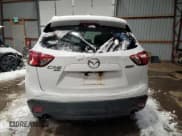 ✅ 2015 Mazda CX-5 Touring • VIN: JM3KE4CY6F0520738 • Lot: 91903825. Listed on Copart with 171,618 mi. Free auction sales archive from the USA and detailed vehicle history report at DreamBid. Image 6.