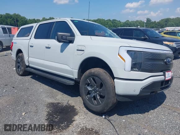 ✅ 2023 Ford F-150 Lightning Pro • VIN: 1FT6W1EVXPWG35446 • Лот: 42750723. Опубликован ранее на IAAI с пробегом 45 348 миль. Бесплатный доступ к архиву аукционных продаж из США и подробный отчёт об истории автомобиля на DreamBid. Изображение 1.