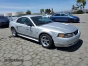 ✅ 2004 Ford Mustang Standard • VIN: 1FAFP40684F199938 • Lot: 56705465. Listed on Copart with 182,008 mi. Free auction sales archive from the USA and detailed vehicle history report at DreamBid. Image 4.