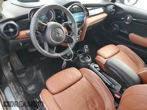 ✅ 2023 MINI Hardtop Cooper • VIN: WMW33DH02P2S77440 • Лот: 56637555. Опубликован ранее на Copart с пробегом 38 529 миль. Бесплатный доступ к архиву аукционных продаж из США и подробный отчёт об истории автомобиля на DreamBid. Изображение 8.