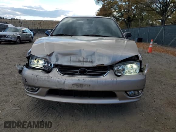 ✅ 2002 Toyota Corolla CE • VIN: 1NXBR12E72Z598558 • Lot: 82772345. Listed on Copart with 148,414 mi. Free auction sales archive from the USA and detailed vehicle history report at DreamBid. Image 5.