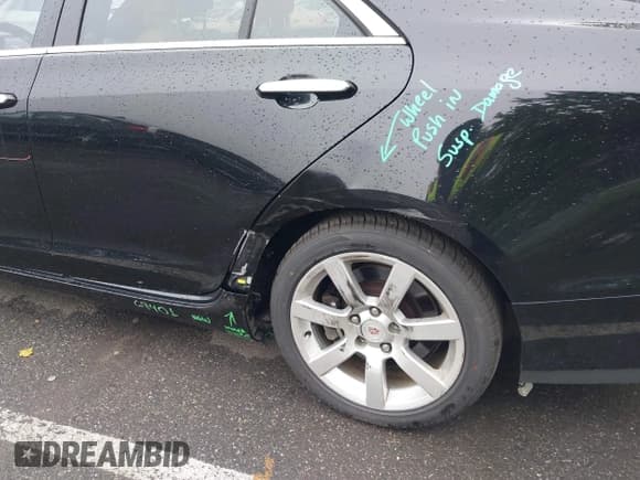 ✅ 2014 Cadillac ATS Standard RWD • VIN: 1G6AA5RA0E0106484 • Lot: 42496217. Listed on IAAI with 124,543 mi. Free auction sales archive from the USA and detailed vehicle history report at DreamBid. Image 13.