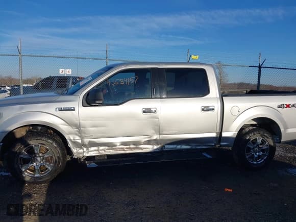 ✅ 2015 Ford F-150 XLT • VIN: 1FTEW1EG1FFC05557 • Lot: 43584157. Listed on IAAI with 218,179 mi. Free auction sales archive from the USA and detailed vehicle history report at DreamBid. Image 14.
