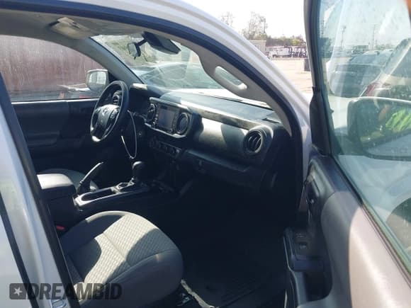 ✅ 2023 Toyota Tacoma SR • VIN: 3TMCZ5AN5PM594103 • Лот: 42675803. Опубликован ранее на IAAI с пробегом 21 759 миль. Бесплатный доступ к архиву аукционных продаж из США и подробный отчёт об истории автомобиля на DreamBid. Изображение 5.