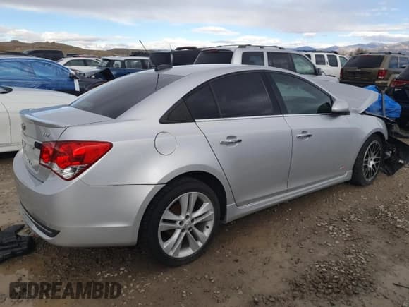 ✅ 2015 Chevrolet Cruze LTZ • VIN: 1G1PG5SB4F7155178 • Lot: 86479395. Listed on Copart with Not provided. Free auction sales archive from the USA and detailed vehicle history report at DreamBid. Image 3.