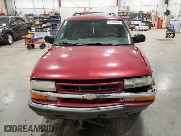 ✅ 1999 Chevrolet Blazer LS • VIN: 1GNDT13W7X2129972 • Lot: 83786284. Wystawiony na Copart z przebiegiem Nie podano. Bezpłatny archiwum sprzedaży aukcyjnych z USA i szczegółowy raport historii pojazdu na DreamBid. Zdjęcie 5.