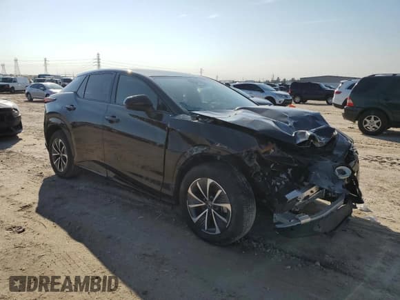 ✅ 2023 Lexus RZ 450e Premium • VIN: JTJAAAAB2PA007458 • Лот: 47473275. Опубликован ранее на Copart с пробегом 6 041 миль. Бесплатный доступ к архиву аукционных продаж из США и подробный отчёт об истории автомобиля на DreamBid. Изображение 4.