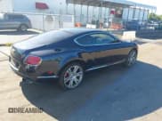✅ 2015 Bentley Continental GT • VIN: SCBFH7ZA0FC049703 • Lot: 42803794. Listed on IAAI with 85,149 mi. Free auction sales archive from the USA and detailed vehicle history report at DreamBid. Image 4.