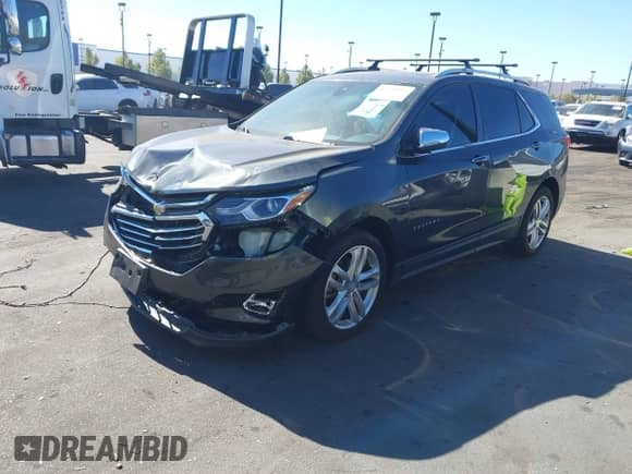 2018 Chevrolet Equinox Premier с VIN 3GNAXNEX8JS508432, выставлен на аукционе IAAI как лот 43558959 с пробегом 84 489 миль миль и . История ставок и продаж доступна на DreamBid. Изображение 18.