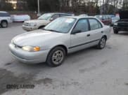 ✅ 2000 Chevrolet Prizm • VIN: 1Y1SK5281YZ411235 • Lot: 43719764. Listed on IAAI with 96,400 mi. Free auction sales archive from the USA and detailed vehicle history report at DreamBid. Image 2.