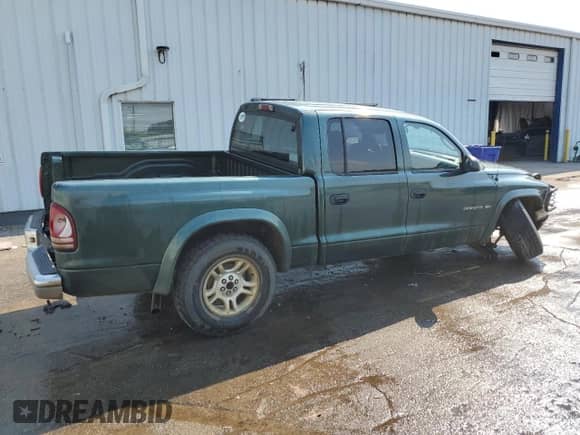 2002 Dodge Dakota SLT with VIN 1B7HG48N12S634155, listed as a Copart auction lot 71431625 with 227,575 mi miles and Salvage title. Bid and sale history available at DreamBid. Image 3.
