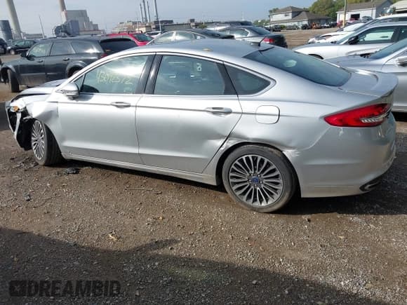 ✅ 2017 Ford Fusion Titanium • VIN: 3FA6P0K91HR185551 • Лот: 43092372. Опубликован ранее на IAAI с пробегом 75 426 миль. Бесплатный доступ к архиву аукционных продаж из США и подробный отчёт об истории автомобиля на DreamBid. Изображение 14.