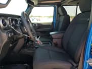 ✅ 2023 Jeep Wrangler Sahara • VIN: 1C4HJXEN2PW665292 • Лот: 57420785. Опубликован ранее на Copart с пробегом 20 719 миль. Бесплатный доступ к архиву аукционных продаж из США и подробный отчёт об истории автомобиля на DreamBid. Изображение 7.