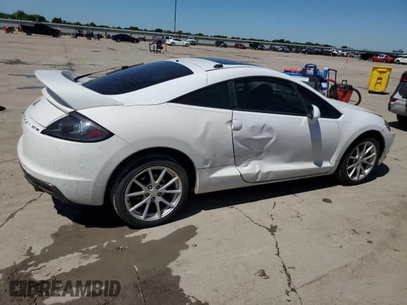 ✅ 2009 Mitsubishi Eclipse GT • VIN: 4A3AK34T89E014505 • Lot: 53554425. Listed on Copart with 125,794 mi. Free auction sales archive from the USA and detailed vehicle history report at DreamBid. Image 3.
