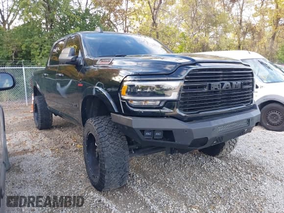 ✅ 2022 Ram 2500 Laramie • VIN: 3C6UR5FL1NG327295 • Lot: 43548472. Listed on IAAI with 107,821 mi. Free auction sales archive from the USA and detailed vehicle history report at DreamBid. Image 1.