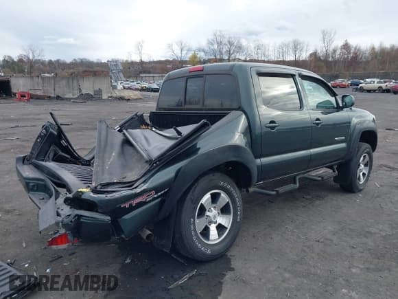 ✅ 2009 Toyota Tacoma • VIN: 3TMLU42N29M033870 • Lot: 43712554. Wystawiony na IAAI z przebiegiem 112 096 mil. Bezpłatny archiwum sprzedaży aukcyjnych z USA i szczegółowy raport historii pojazdu na DreamBid. Zdjęcie 4.