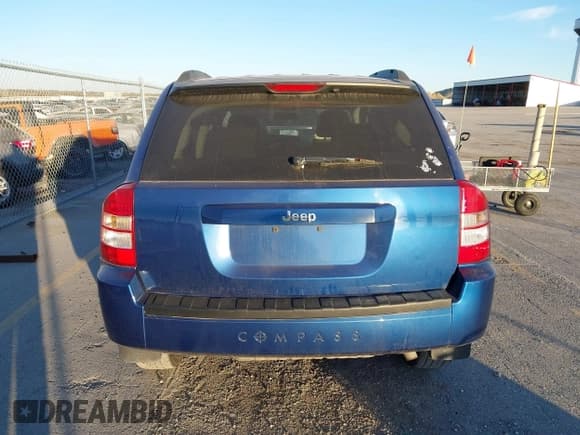 ✅ 2010 Jeep Compass Sport • VIN: 1J4NT4FA1AD516778 • Lot: 43634269. Listed on IAAI with 206,015 mi. Free auction sales archive from the USA and detailed vehicle history report at DreamBid. Image 16.