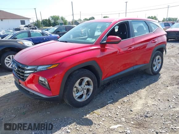 2022 Hyundai Tucson SE z VIN 5NMJACAE3NH069298, wystawiony jako IAAI lot #43183870 z przebiegiem 66 569 mil mil oraz . Historia ofert i sprzedaży dostępna na DreamBid. Obrazek 2.