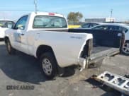 ✅ 2014 Toyota Tacoma • VIN: 5TFNX4CN5EX035731 • Lot: 43623930. Listed on IAAI with 129,893 mi. Free auction sales archive from the USA and detailed vehicle history report at DreamBid. Image 3.