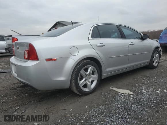 ✅ 2011 Chevrolet Malibu 1LS • VIN: 1G1ZB5E12BF234469 • Lot: 80911784. Listed on Copart with 228,949 mi. Free auction sales archive from the USA and detailed vehicle history report at DreamBid. Image 3.