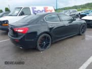 ✅ 2014 Maserati Ghibli • VIN: ZAM57XSA7E1091443 • Lot: 42163436. Listed on IAAI with 76,762 mi. Free auction sales archive from the USA and detailed vehicle history report at DreamBid. Image 4.