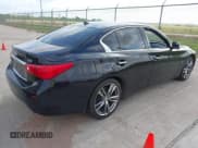 ✅ 2014 Infiniti Q50 Premium • VIN: JN1BV7AP3EM679036 • Lot: 42071447. Listed on IAAI with 181,691 mi. Free auction sales archive from the USA and detailed vehicle history report at DreamBid. Image 4.