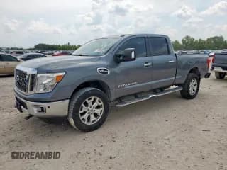 ✅ 2017 Nissan Titan SV • VIN: 1N6AA1F25HN544618 • Lot: 69580255. Listed on Copart with 100,512 mi. Free auction sales archive from the USA and detailed vehicle history report at DreamBid. Image 1.