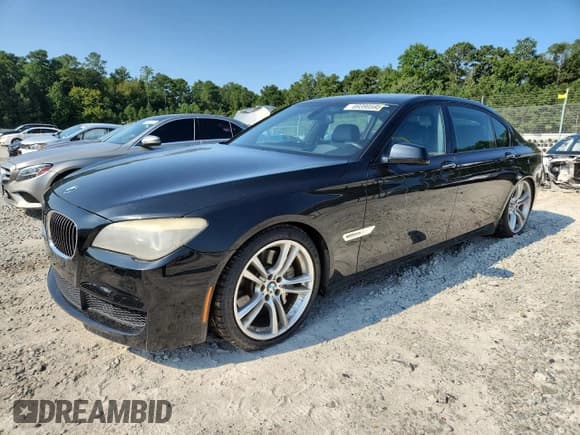 ✅ 2012 BMW 7 Series 750Li • VIN: WBAKB8C5XCC964548 • Лот: 69390595. Опубликован ранее на Copart с пробегом 126 548 миль. Бесплатный доступ к архиву аукционных продаж из США и подробный отчёт об истории автомобиля на DreamBid. Изображение 1.