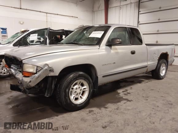 ✅ 1999 Dodge Dakota SLT • VIN: 1B7GL22X1XS175934 • Lot: 41614522. Wystawiony na IAAI z przebiegiem 127 373 mil. Bezpłatny archiwum sprzedaży aukcyjnych z USA i szczegółowy raport historii pojazdu na DreamBid. Zdjęcie 2.